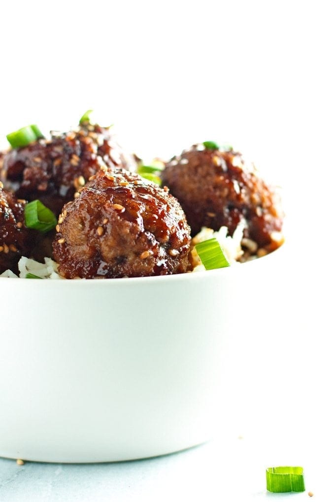 straight on shot of bowl full of beef teriyaki meatballs.