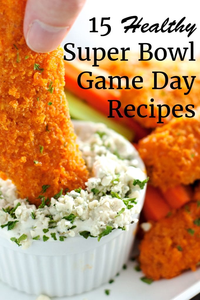 healthy super bowl game day recipes, baked buffalo chicken tender dipped in blue cheese