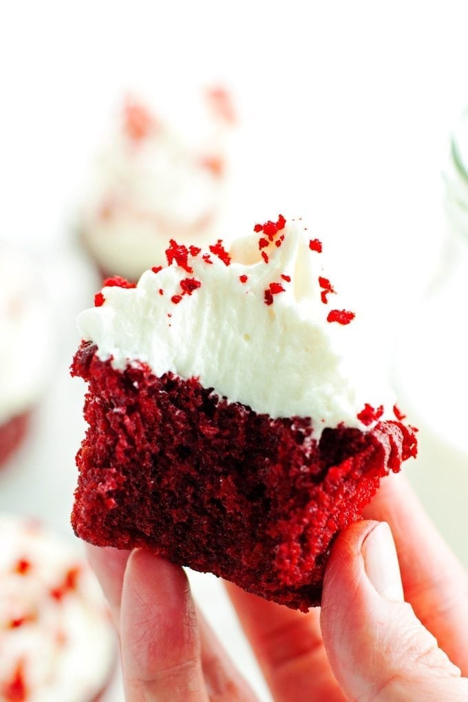 red velvet cupcake with a delicious bite out of it