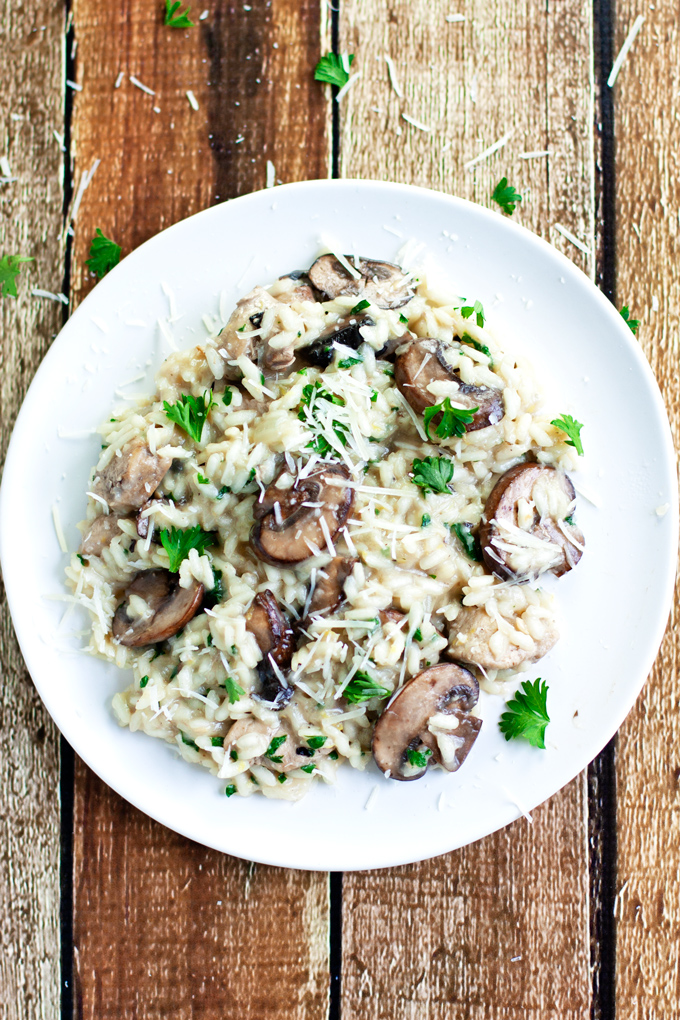 Top view of a plate of creamy chicken and mushroom risotto